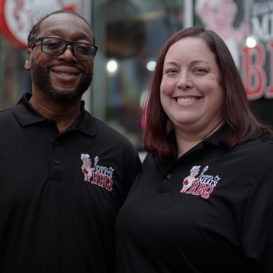Sweets and Meats BBQ staff members infront of their restaurant