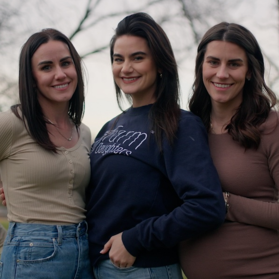 3 Farm Daughters posing together outside