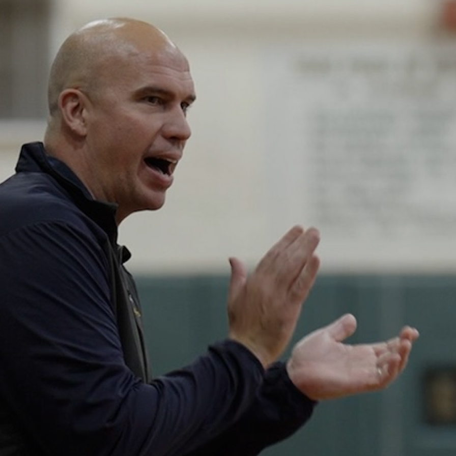 Vertical Hoops coach talking and clapping hands